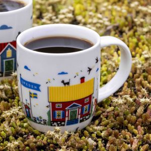 Liten Porslin mugg med rött hus